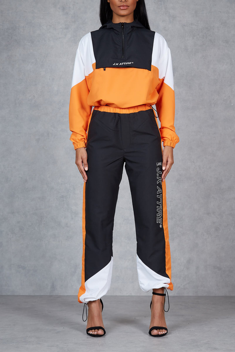 Aspen Shell Track Pants - Orange/Black/White